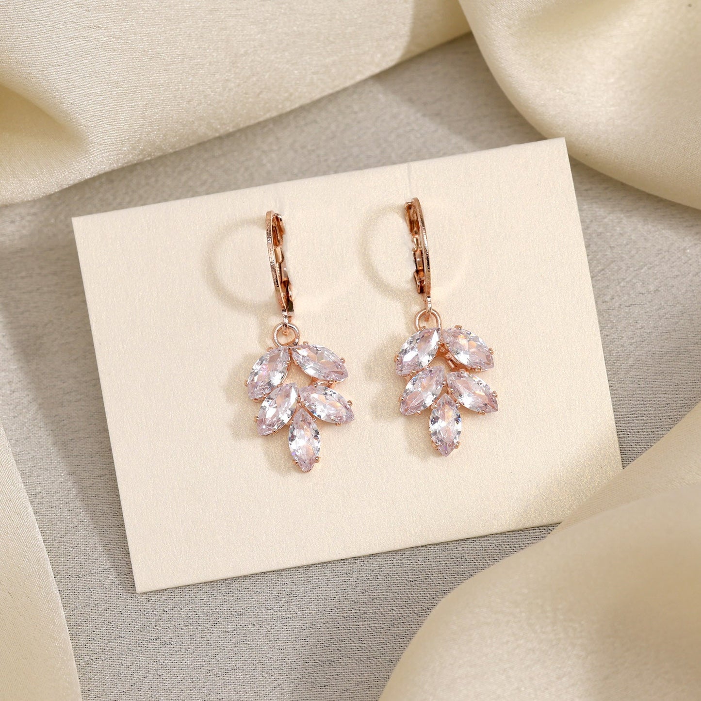 White Color Antique Stone Earrings Featuring Ornate Patterns And Vintage Vibes