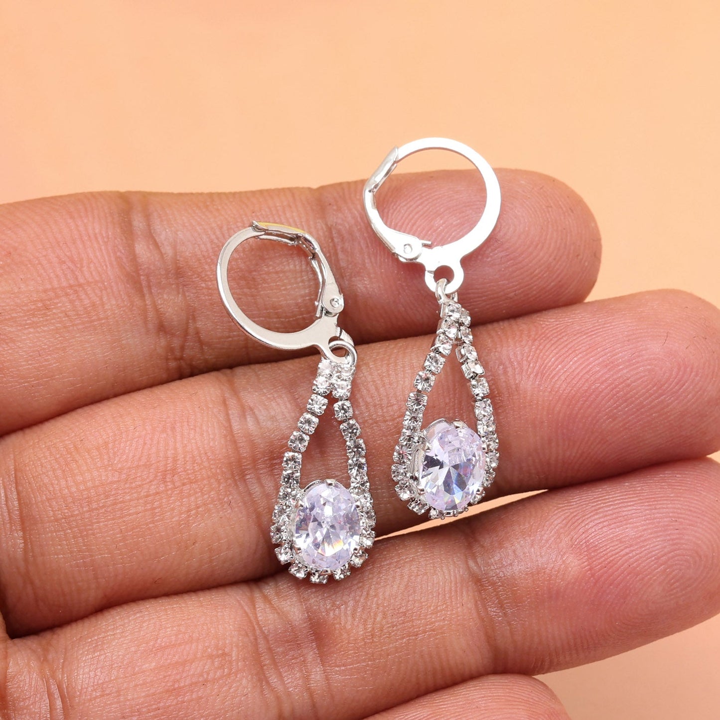 Refined Beauty: Silver Color Antique Stone Earrings With Artistic Touch
