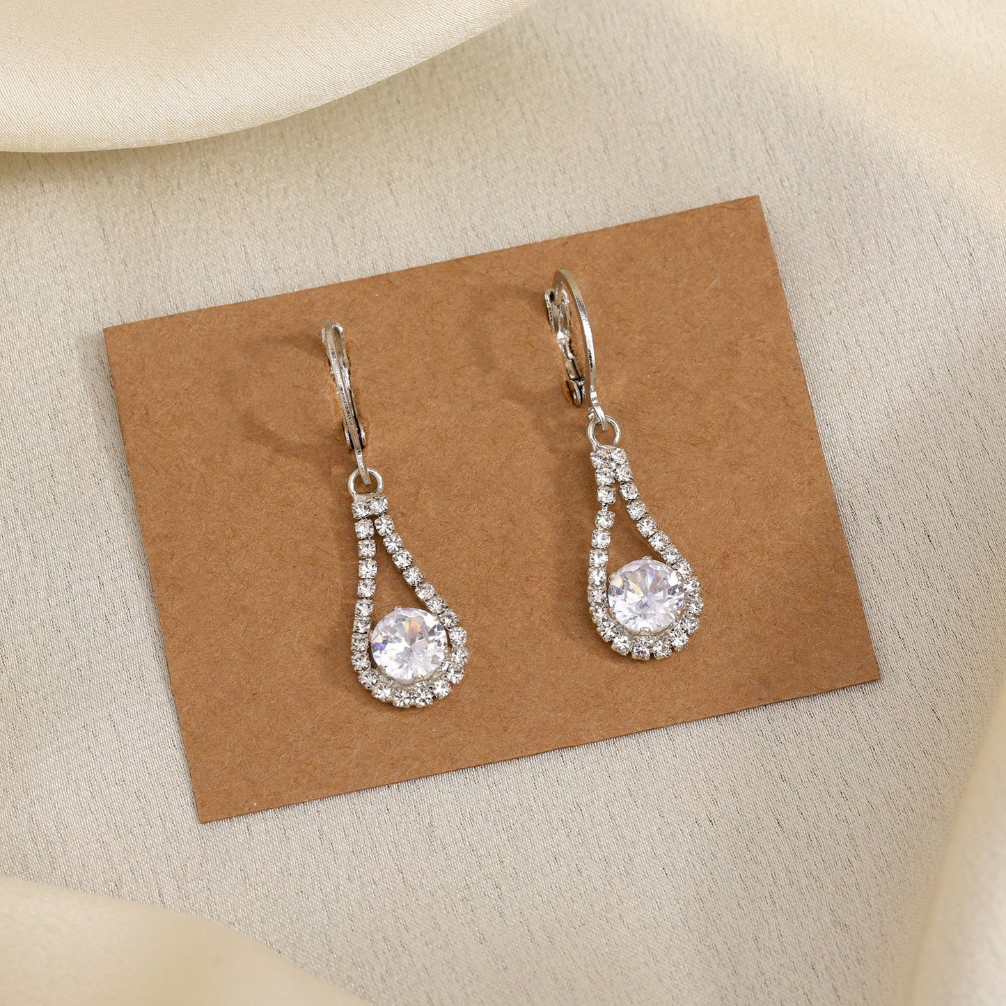 Refined Beauty: Silver Color Antique Stone Earrings With Artistic Touch