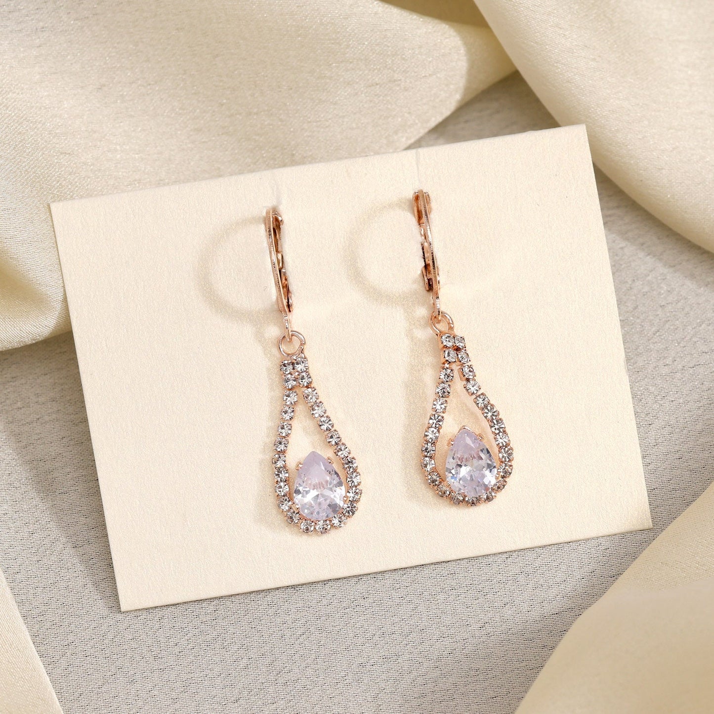 White Color Antique Stone Earrings With A Touch Of Noble Sophistication