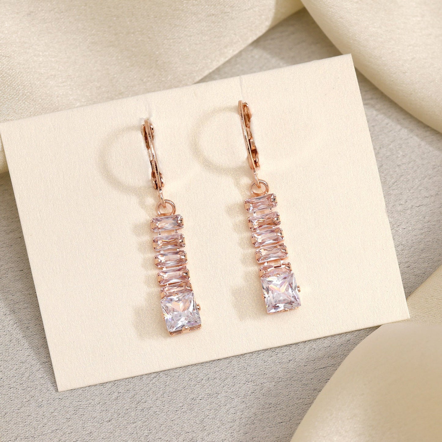 Glowing In Elegance: White Color Antique Stone Earrings With Lush Finish