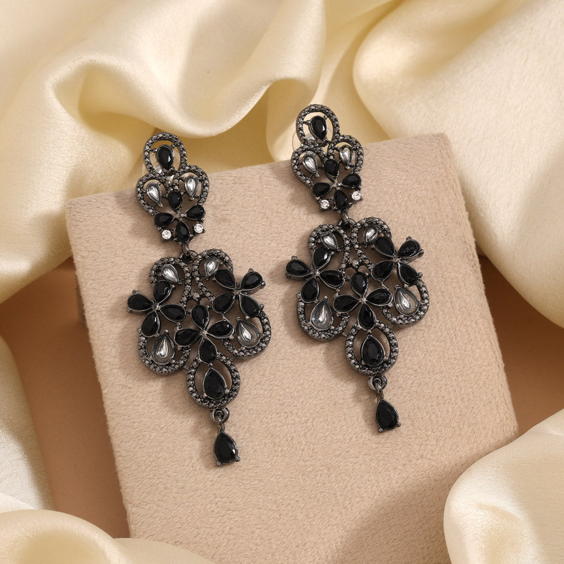 Black Color Fashion Earrings With Metallic Textures And Bold Look