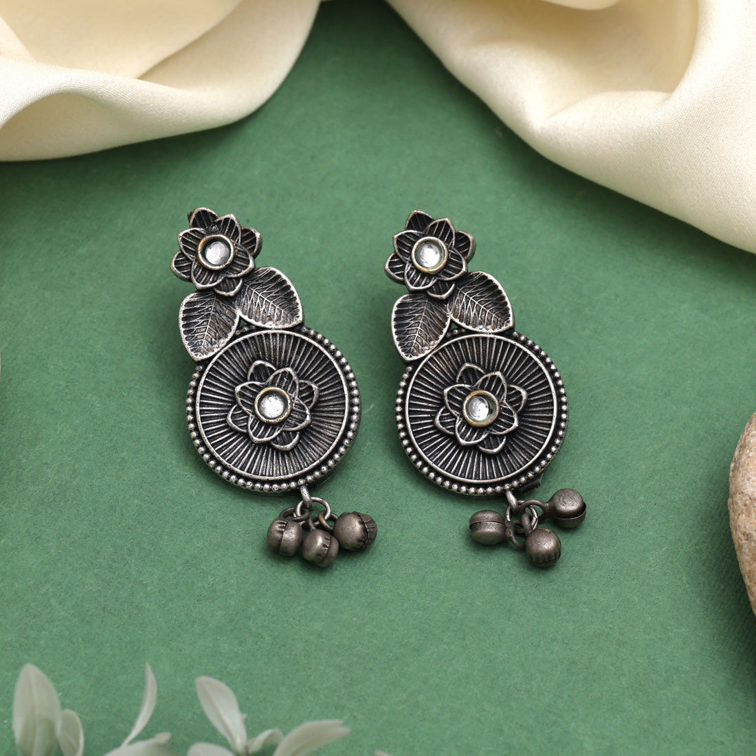 White Color Oxidised Earrings With Antique Touch And Floral Design