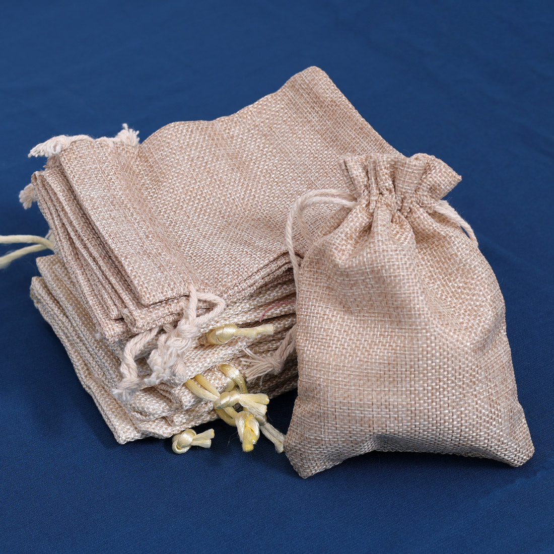 Cream & Beige Color 15 Pieces Of Jute Potli Bags (PTB222CMB)