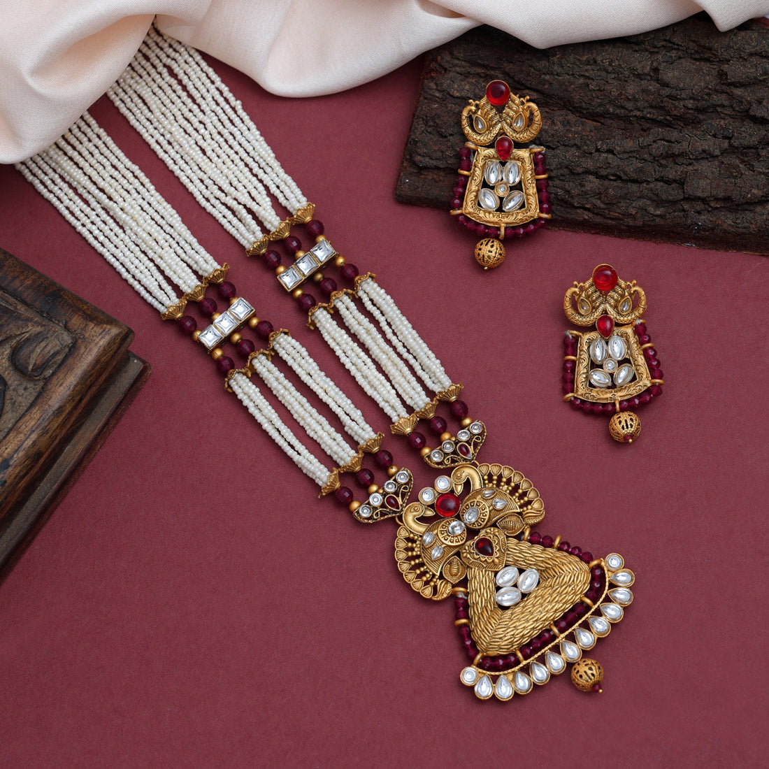 Rani Color Vilandi Kundan Matte Gold Rajwadi Temple Necklace Set (TPLN593RNI)