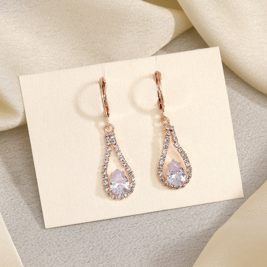 White Color Antique Stone Earrings With A Touch Of Noble Sophistication