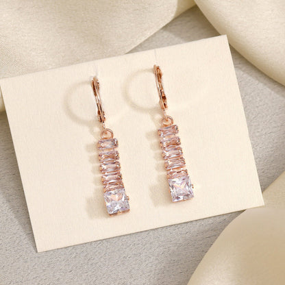Glowing In Elegance: White Color Antique Stone Earrings With Lush Finish