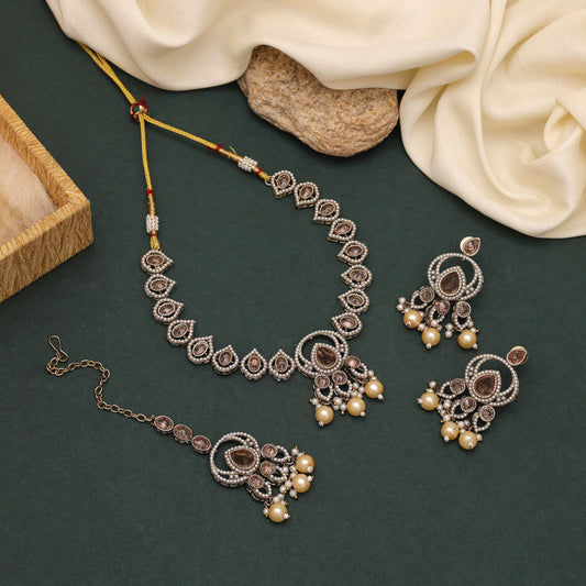 Golden Glow American Diamond Necklaces Set In Gold Color With Stone Detailing