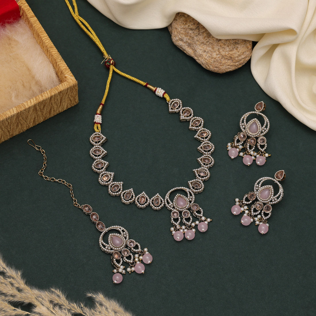 Graceful Pink Color American Diamond Necklaces Set With A Unique Pattern