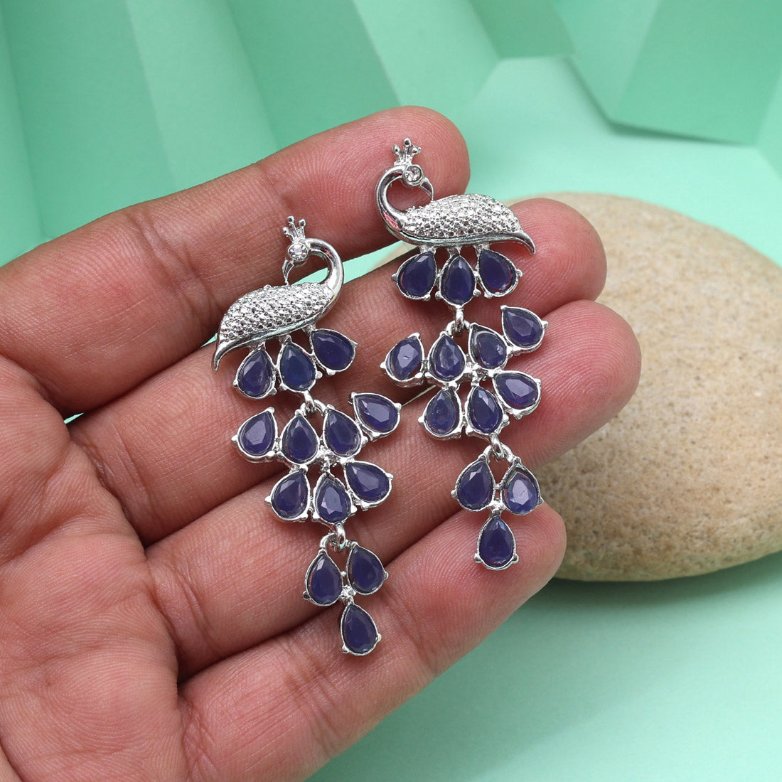 Blue Color Fashion Earrings With Subtle Sparkles And Elegant Contours