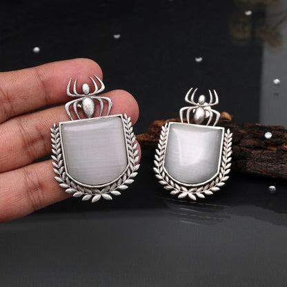 Grey Color Oxidised Earrings Featuring Floral Pattern With Tribal Touch