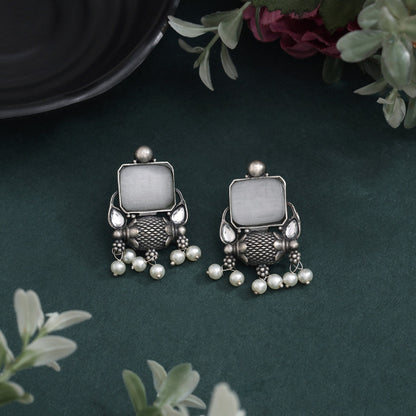 Off White Color Oxidised Earrings With Classic Artistic Tribal Design