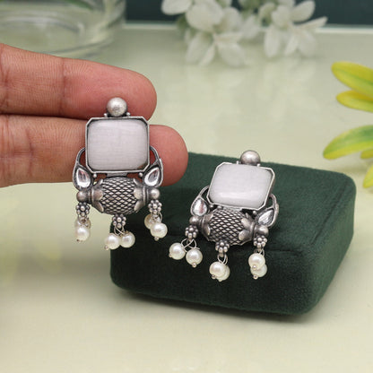 Off White Color Oxidised Earrings With Classic Artistic Tribal Design