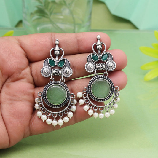 Stylish Pista Green Color Oxidised Earrings With Floral Carving Design