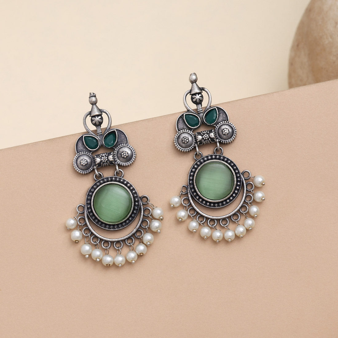 Stylish Pista Green Color Oxidised Earrings With Floral Carving Design