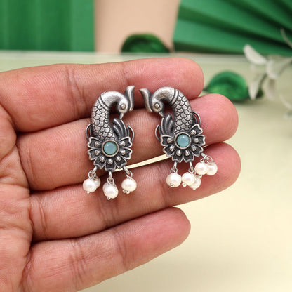Sky Blue Color Oxidised Earrings With Festive Look And Floral Work