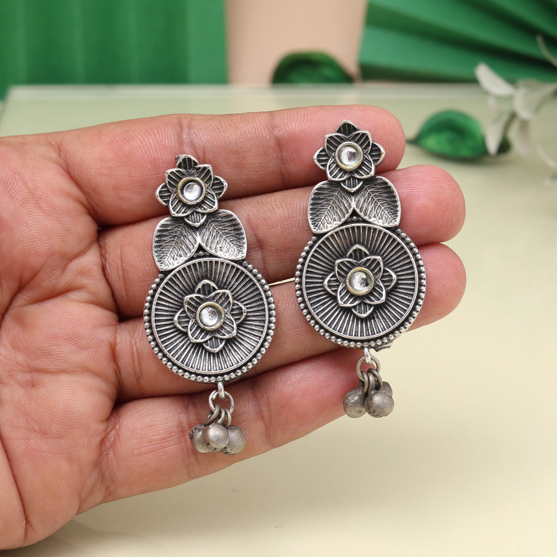 White Color Oxidised Earrings With Antique Touch And Floral Design