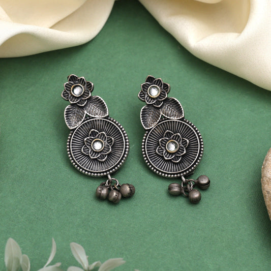 White Color Oxidised Earrings With Antique Touch And Floral Design