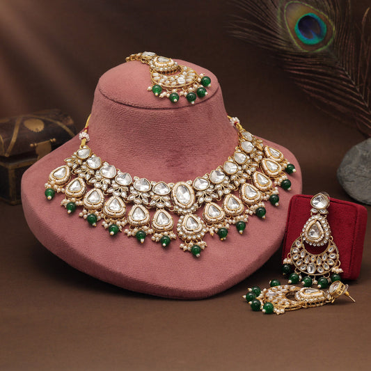 Green Color Kundan Necklace Set With Traditional Detailing And Charm