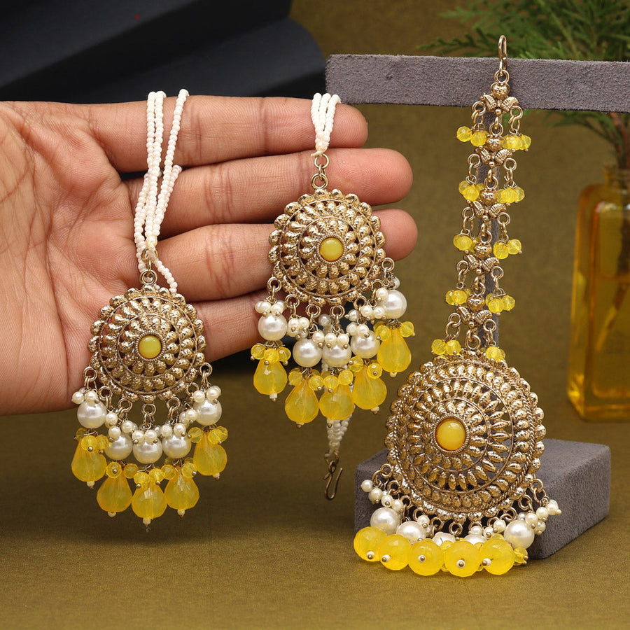 Yellow maang tikka sales