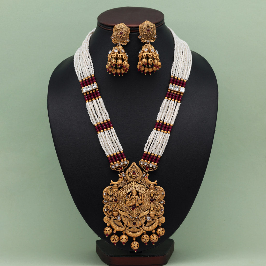 Rani Color Lord Ganesha Vilandi Kundan Matte Gold Rajwadi Temple Necklace Set (TPLN590RNI)