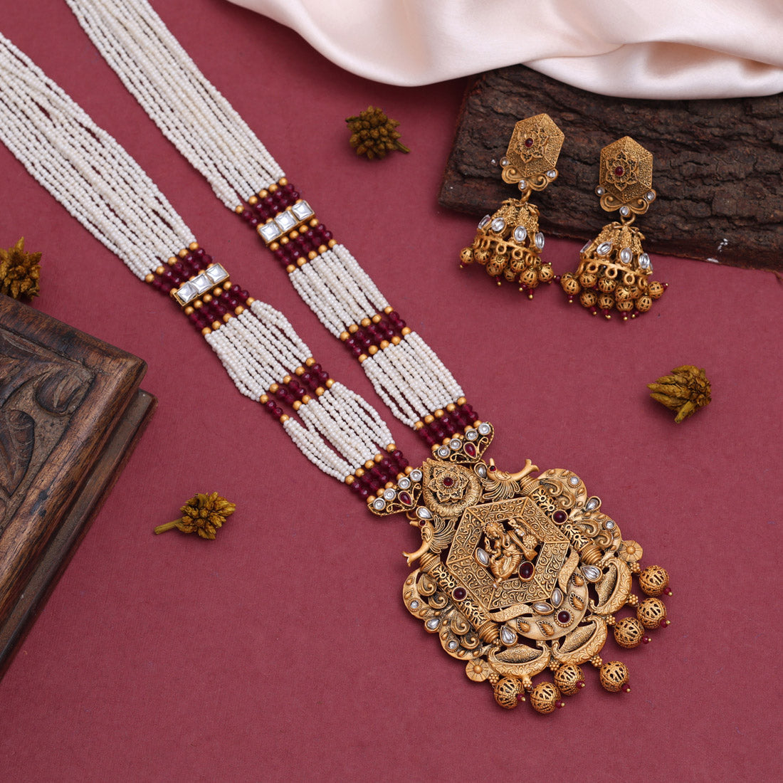 Rani Color Lord Ganesha Vilandi Kundan Matte Gold Rajwadi Temple Necklace Set (TPLN590RNI)